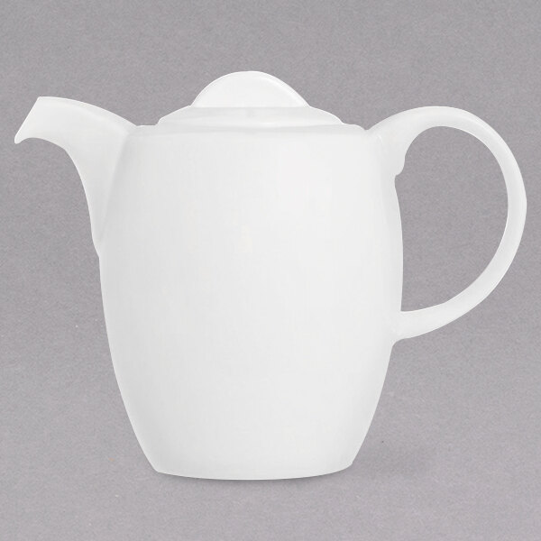 A white Chef & Sommelier teapot with a white handle and lid.