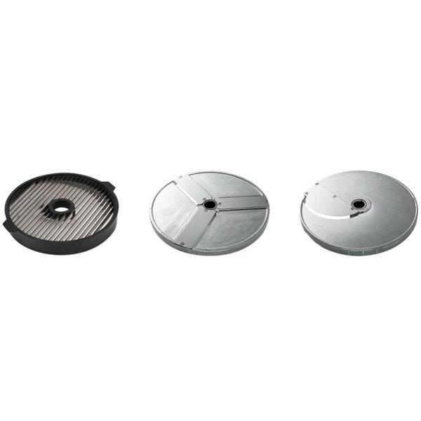 A group of circular silver metal discs with different hole patterns.