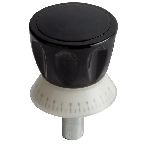 A black knob with a white dial on top.