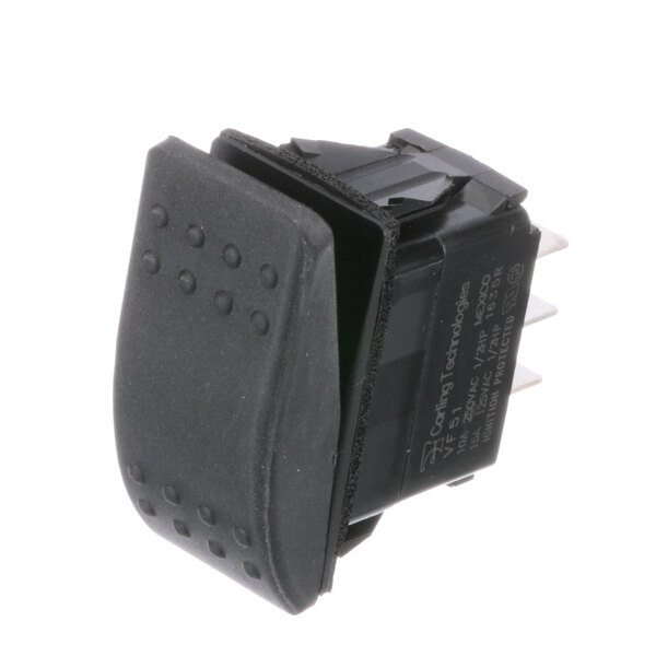 A close up of a black plastic CMA Dishmachines Drain Rocker Switch.