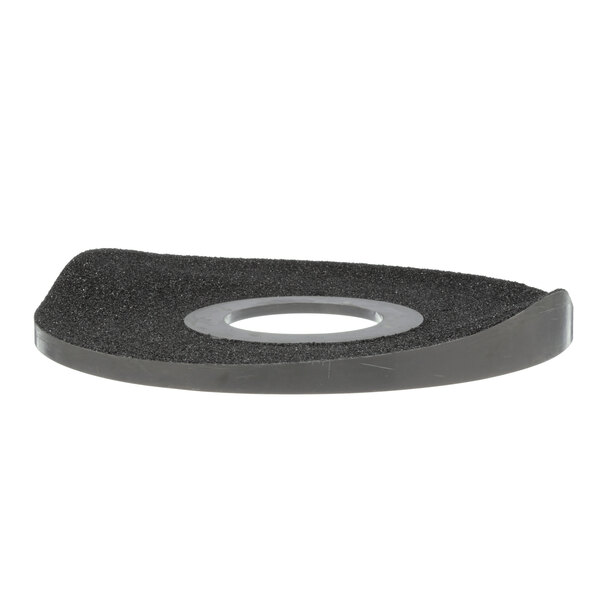A black rubber Hobart disc pad with a hole.