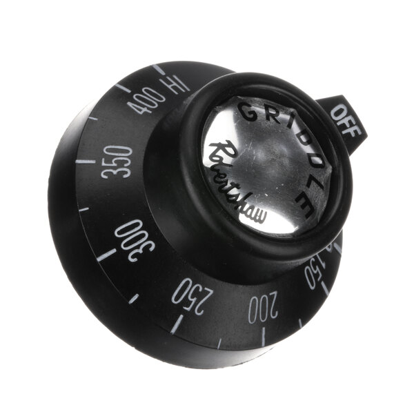 A close-up of a black Royal Range thermostat knob with white numbers.