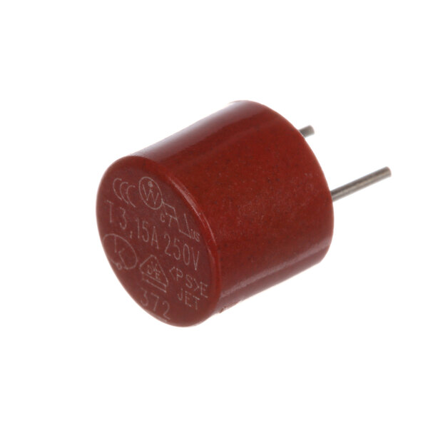 A close-up of a red capacitor with white text and two metal pins.