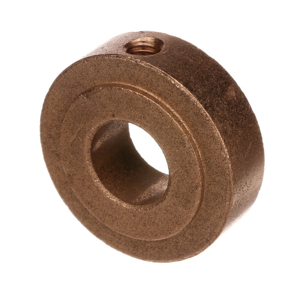A bronze metal round thrust bearing with an open hole.