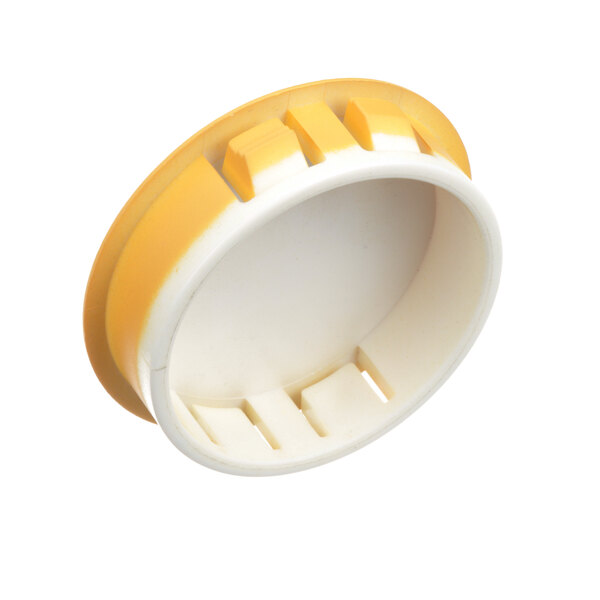 A yellow and white plastic circular knob.