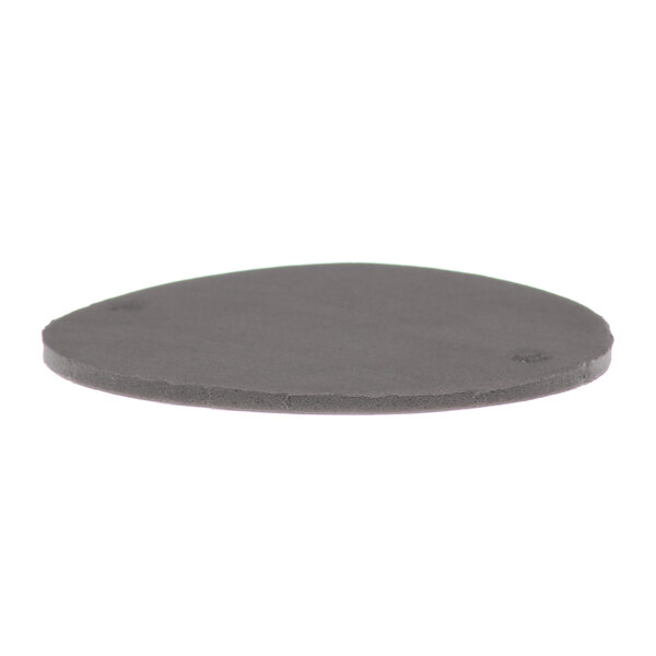 A black circular gasket with a hole in it.