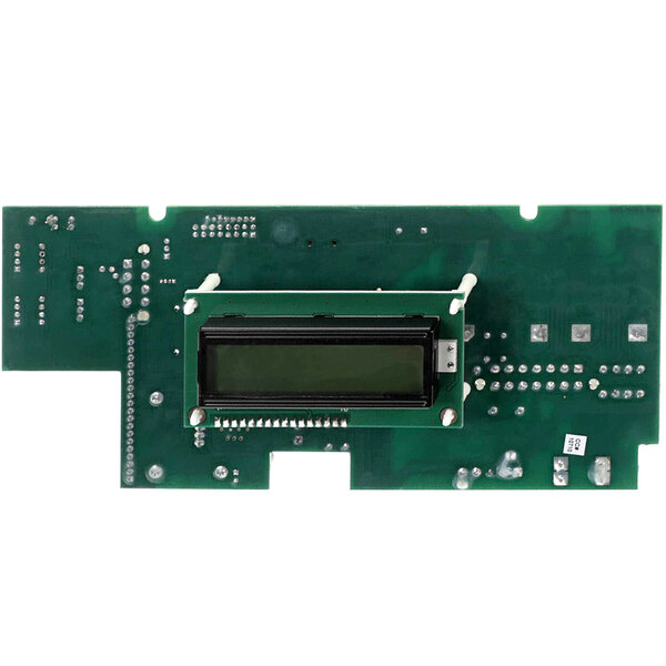 A green circuit board with a black display.