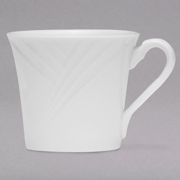 An Arcoroc white porcelain coffee cup with a handle.