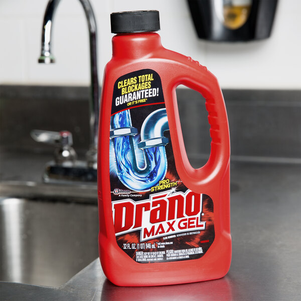 A red bottle of SC Johnson Drano Max Gel Clog Remover on a counter.