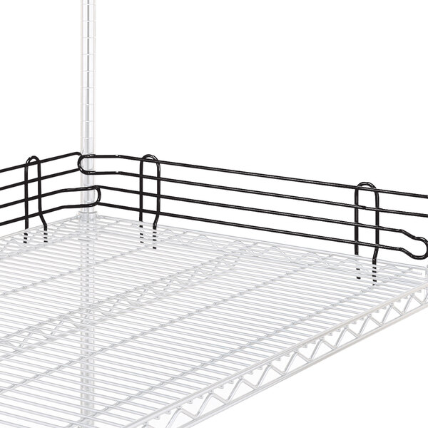 A Metro Super Erecta wire shelf with black wire rods on a black metal ledge.