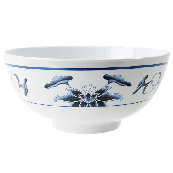 A white GET Water Lily melamine bowl with blue and white designs.
