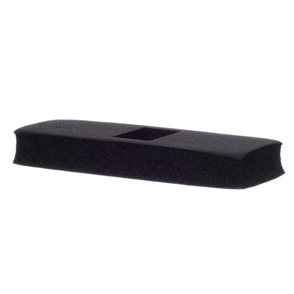 A black plastic barrier with a rectangular hole and a black handle.