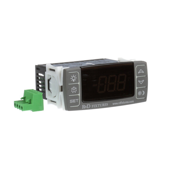 A grey and black Piper Products digital temperature controller with a green connector.
