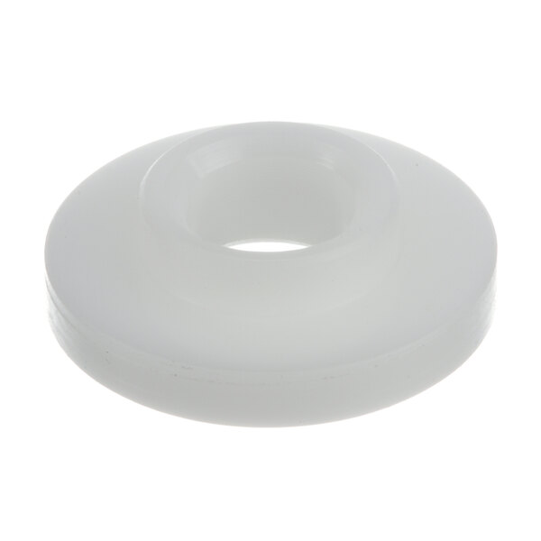 A white round plastic bushing with a hole in the middle.