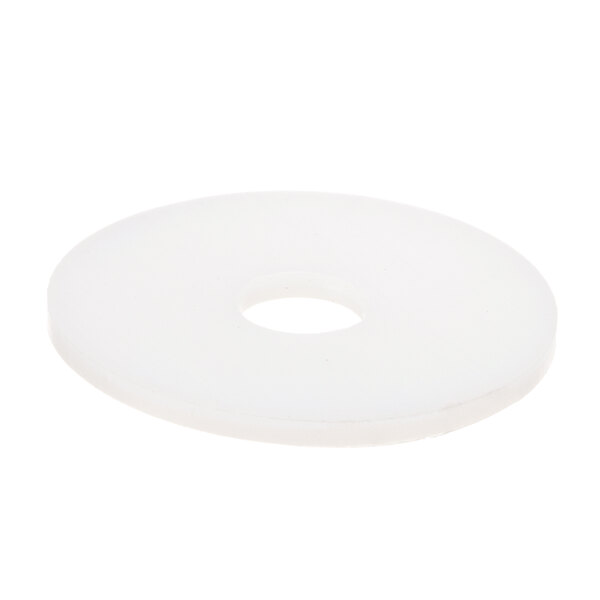 A white round friction pad with a hole.