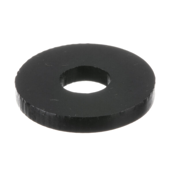A black rubber spacer with a hole in it.