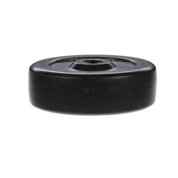 A black plastic knob with a nut on a white background.