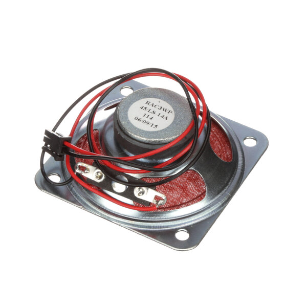 A small round metal speaker with red and black wires.
