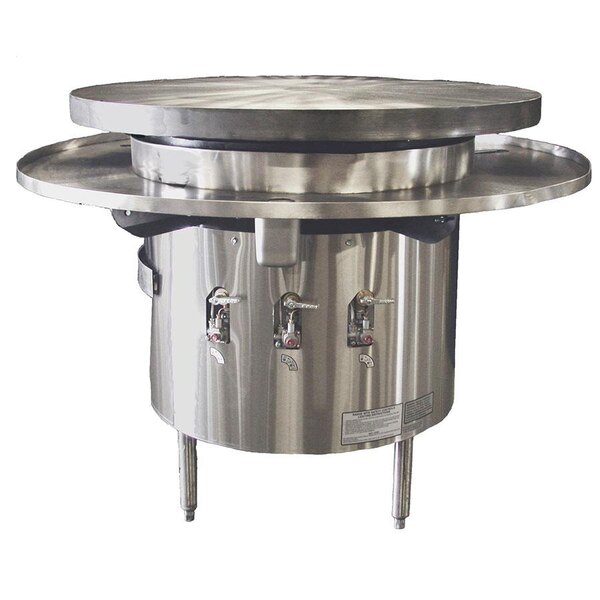 A Town natural gas Mongolian BBQ range with a large round flat top.