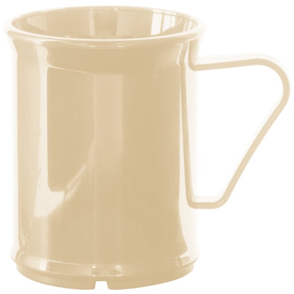 A beige mug with a handle.