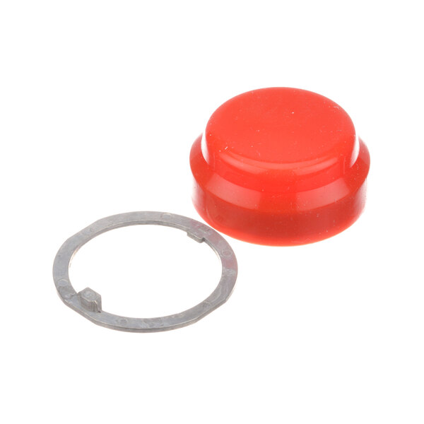 A red rubber stop switch button with a metal ring.