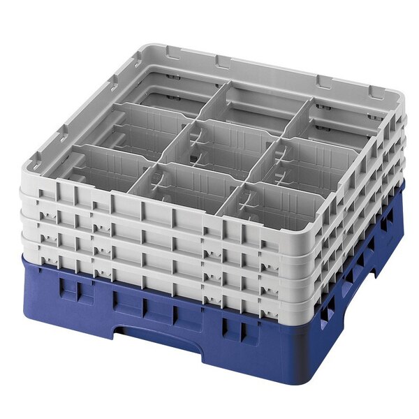 A navy blue plastic Cambro glass rack with six compartments.