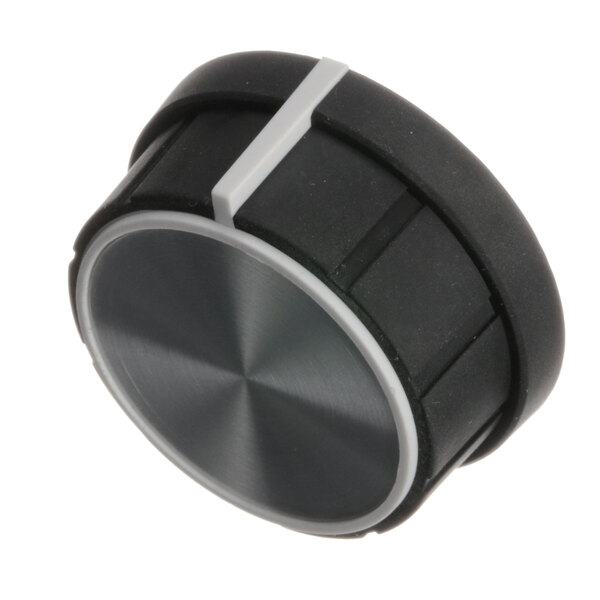 A black and silver circular knob.