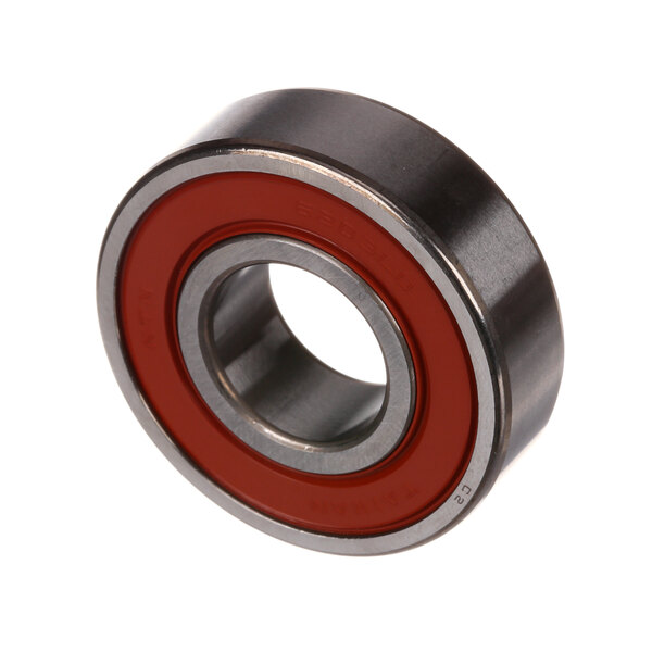 A close-up of a Hobart ball bearing with red rubber on the end.