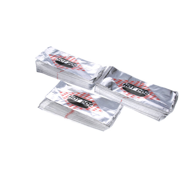 A stack of three silver foil packages of Benchmark USA hot dog bags.