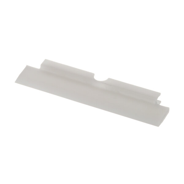 A white plastic scraper blade with a hole at one end.