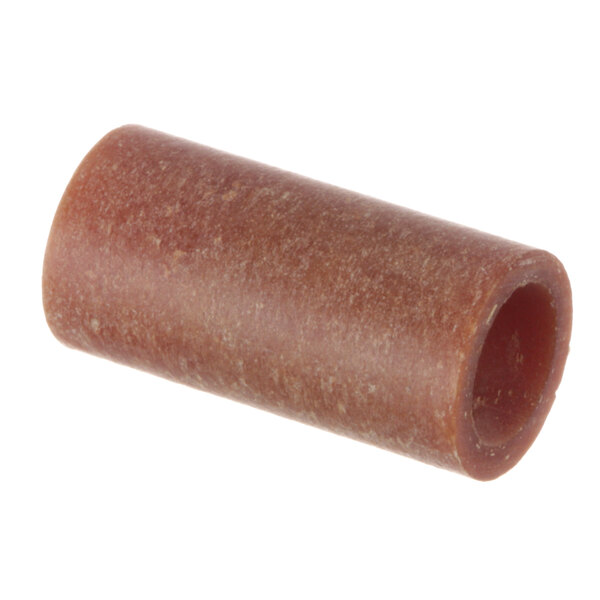 A close-up of a brown cylindrical insulator.