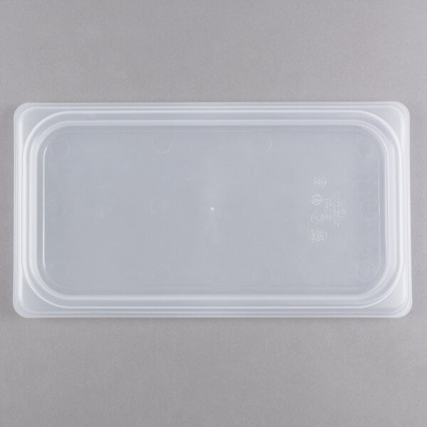 A translucent plastic lid on a plastic container.