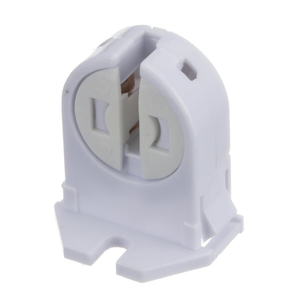 A white plastic Brass Smith 505 tombstone connector with two holes.