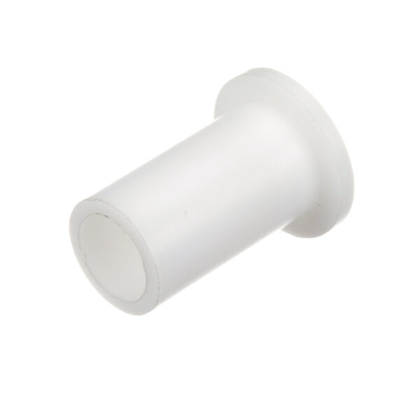A close-up of a white plastic tube with a hole.