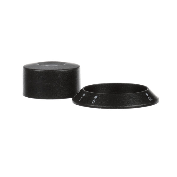 Two black plastic Anvil America countertop food warmer temp knobs with white text on a white background.