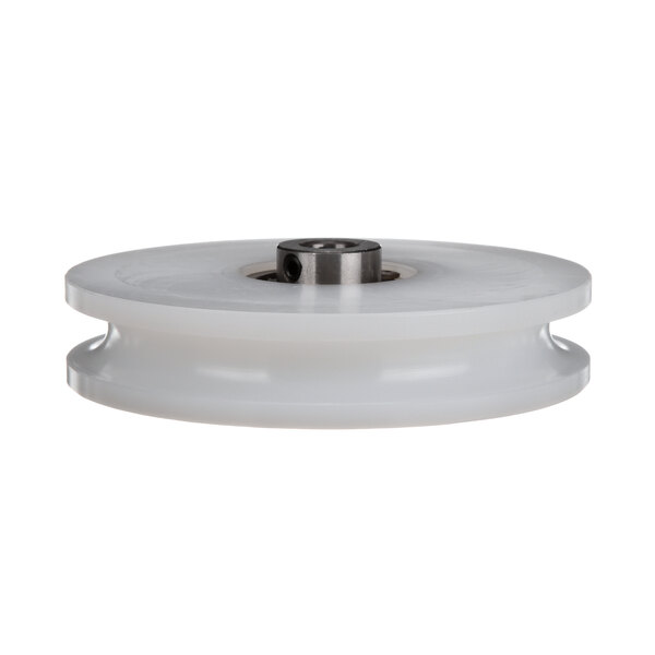 A white plastic pulley with a metal center bearing.