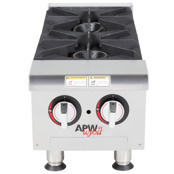 An APW Wyott countertop gas range with two burners.