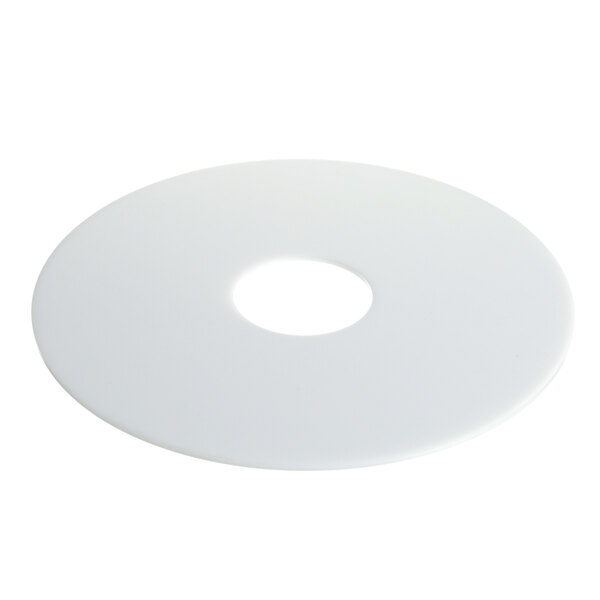 A white plastic disk with a hole in it.