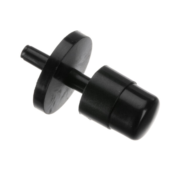 A close-up of a black plastic Dynamic Mixers safety button with a round cap.