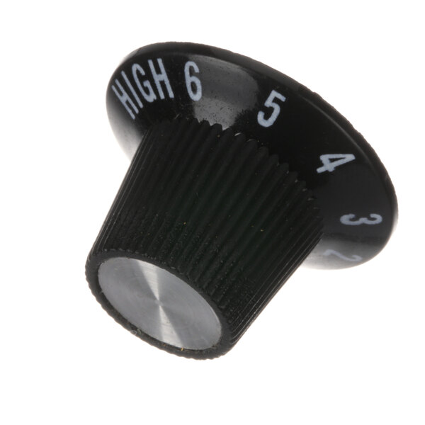 A close-up of a black and silver Adcraft Infinite Knob with white numbers.