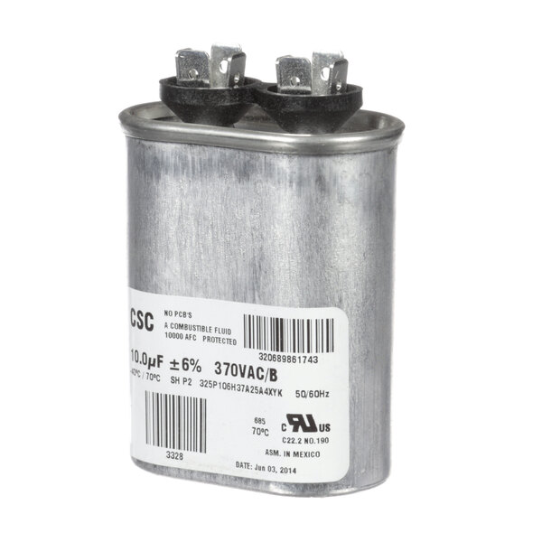 A round metal York International run capacitor with black and white labels.