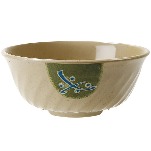 A white fluted melamine bowl with a blue and green Japanese design.