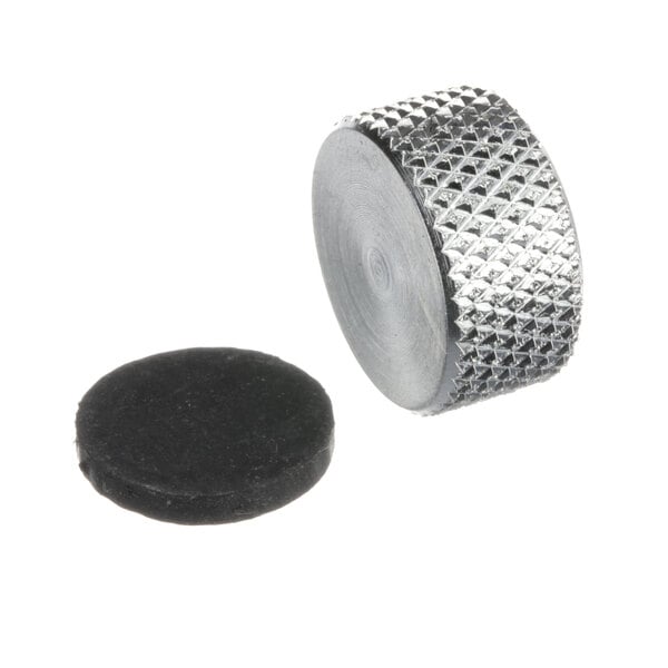 A silver metal knob with a black rubber disc on the end.