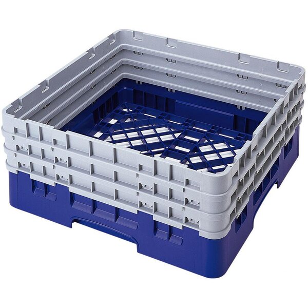 A navy blue plastic Cambro Camrack base with closed sides and three extenders.