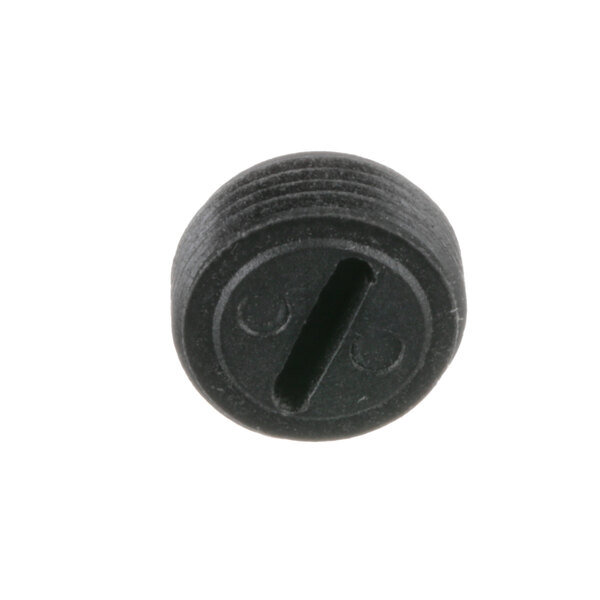 A black rectangular brush cap with a black round button.