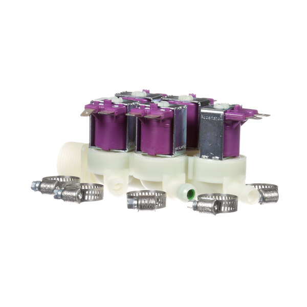 A group of purple and white plastic F'Real valves with wires and hoses.