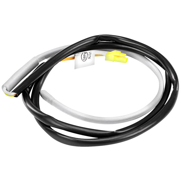 A close-up of a black and white cable with yellow wires on a white background.