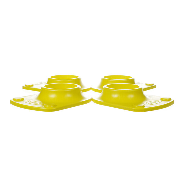 A group of yellow plastic cups with white locking feet.