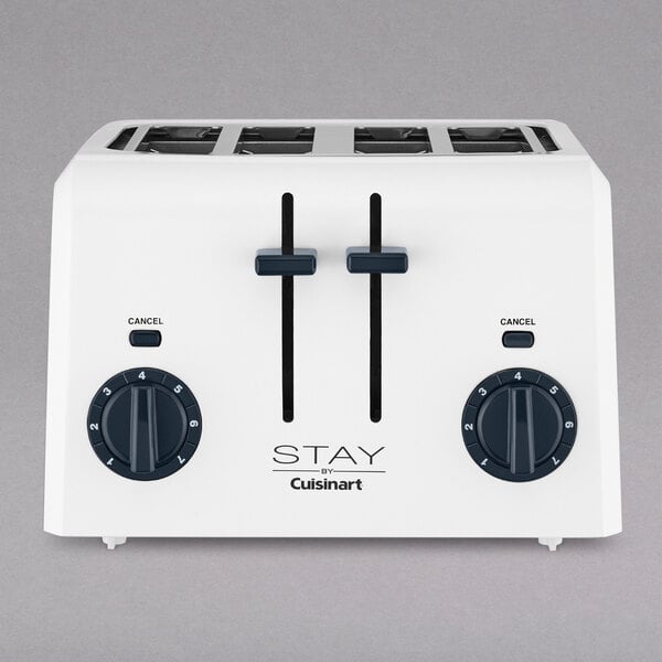 A white STAY by Cuisinart toaster with black knobs and dials.
