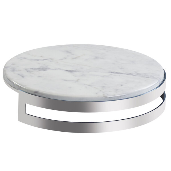 A Cal-Mil marble riser with a metal base on a white table.